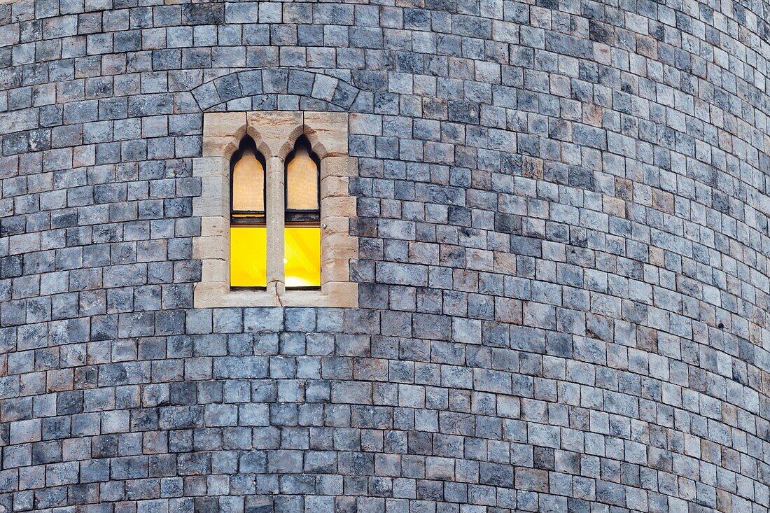 UK, England, Berkshire, Windsor, Windsor Castle, Illuminated Window and Brick Wall