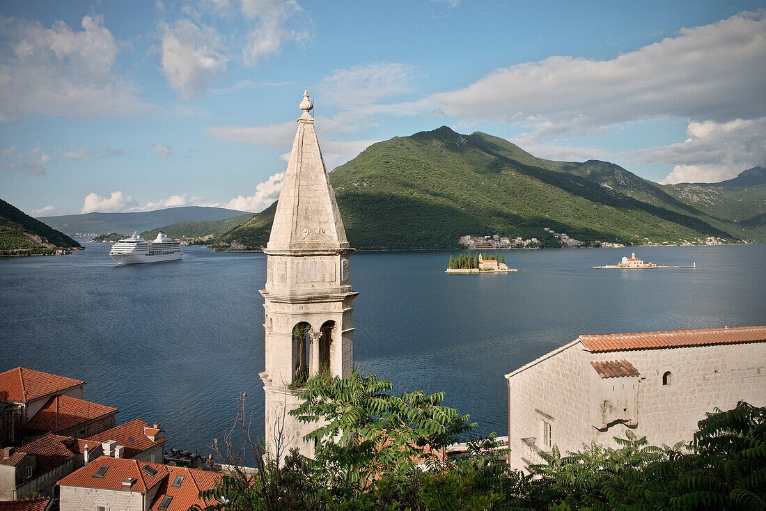 View of Perast with church tower, cruise ship in the background, Island of St. George and Our Lady of the Rock island, Bay of Kotor, Adriatic coastline, Montenegro, Western Balkan, Europe, UNESCO