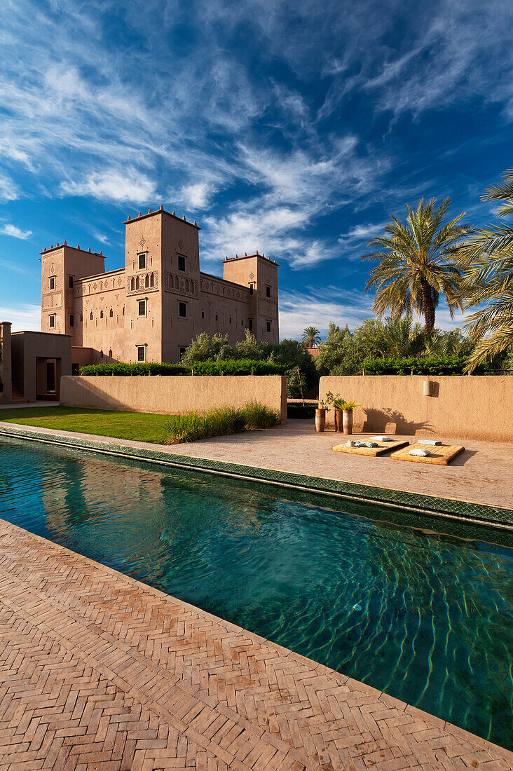 Swimming pool and main kasbah of Dar Ahlam Hotel, Skoura, Morocco