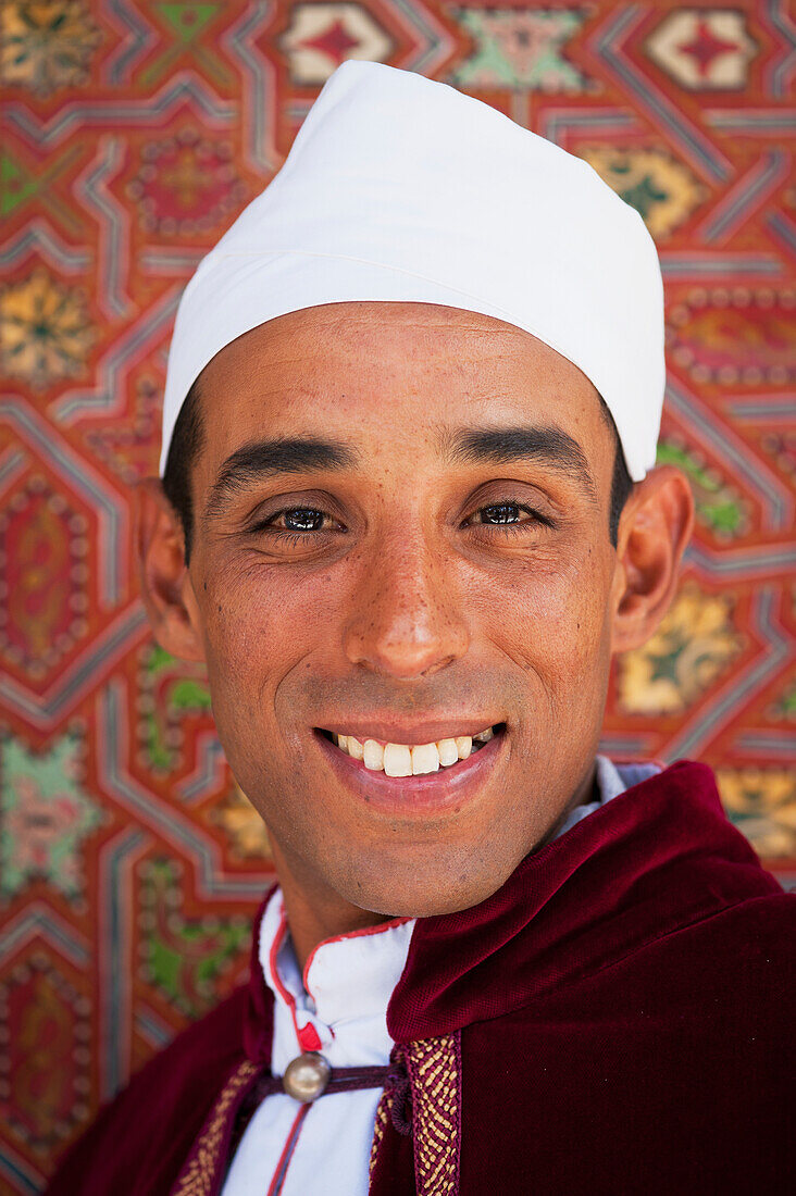 Portrait of man in traditional outfit, Marrakech, Morocco
