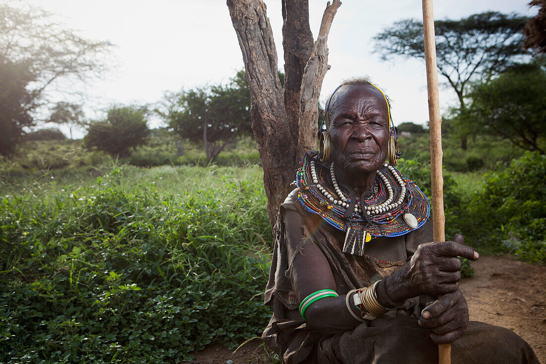 Portrait of traditionally dressed senior woman from Pokot tribe, Lake Baringo, Rift Valley, Kenya