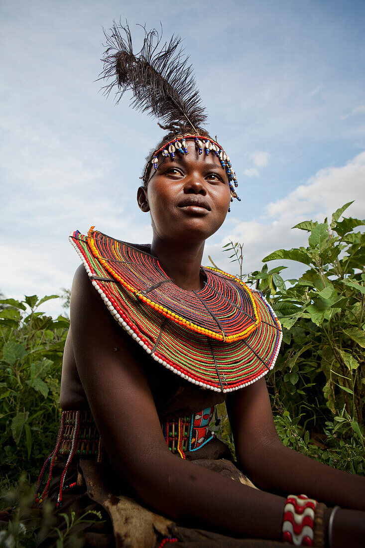 Portrait of traditionally dressed woman from Pokot tribe, Lake Baringo, Rift Valley, Kenya