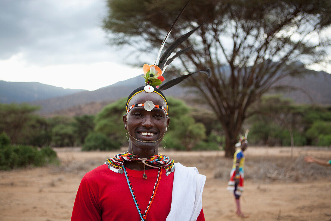 Portrait of young Samburu Moran (warrior) in traditional dress, South Horr, Kenya