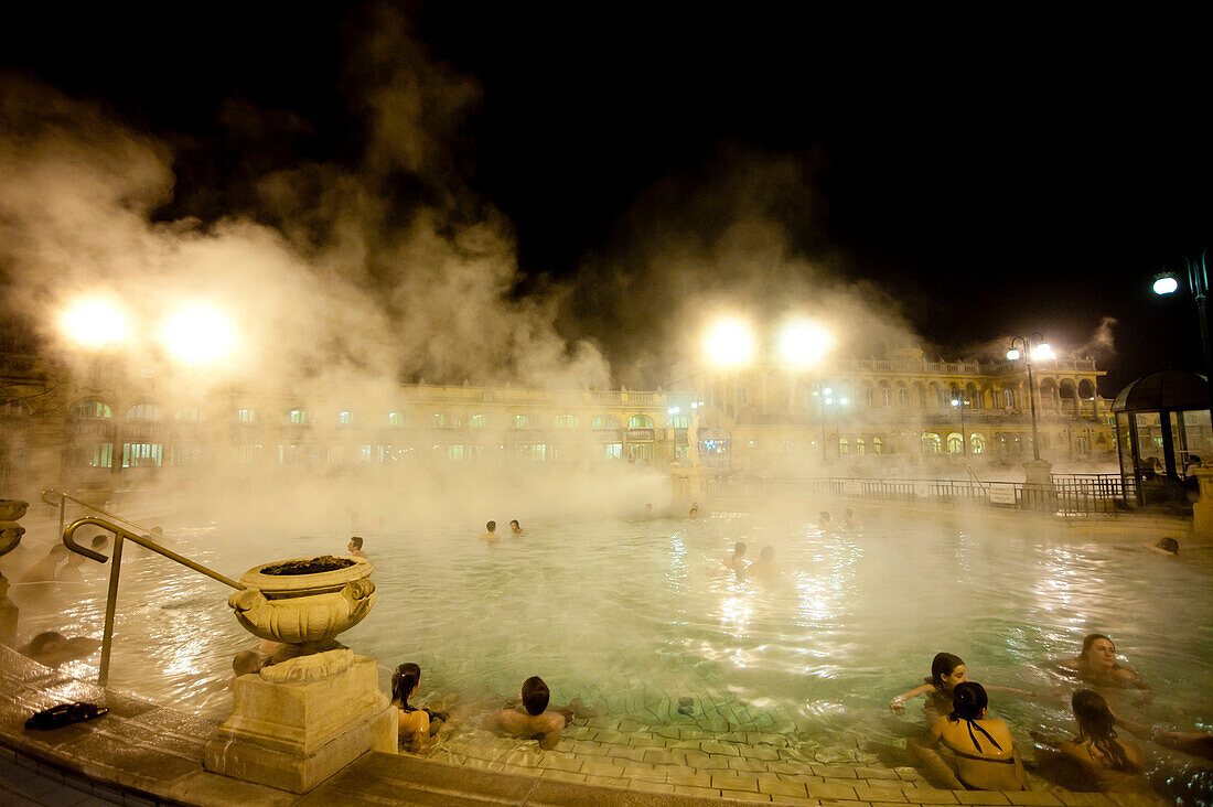 People Enjoying One Of The Outdoor Pools In Szechenyi Baths, Budapest, Hungary