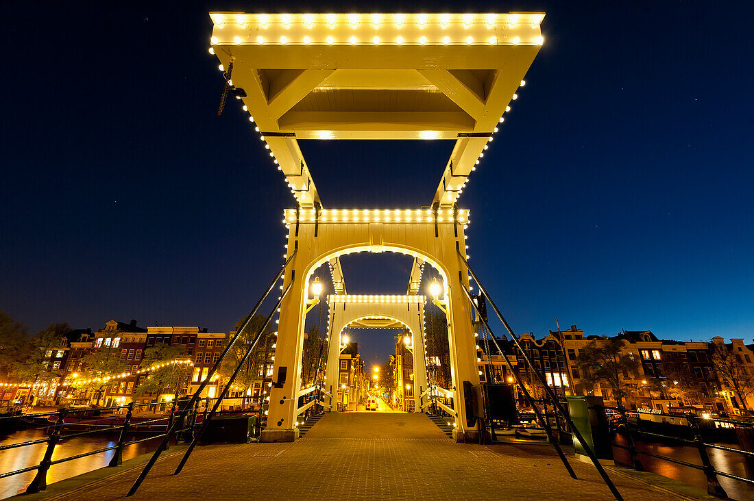 Magere Brug or Skinny Bridge at dusk, Amsterdam, Holland