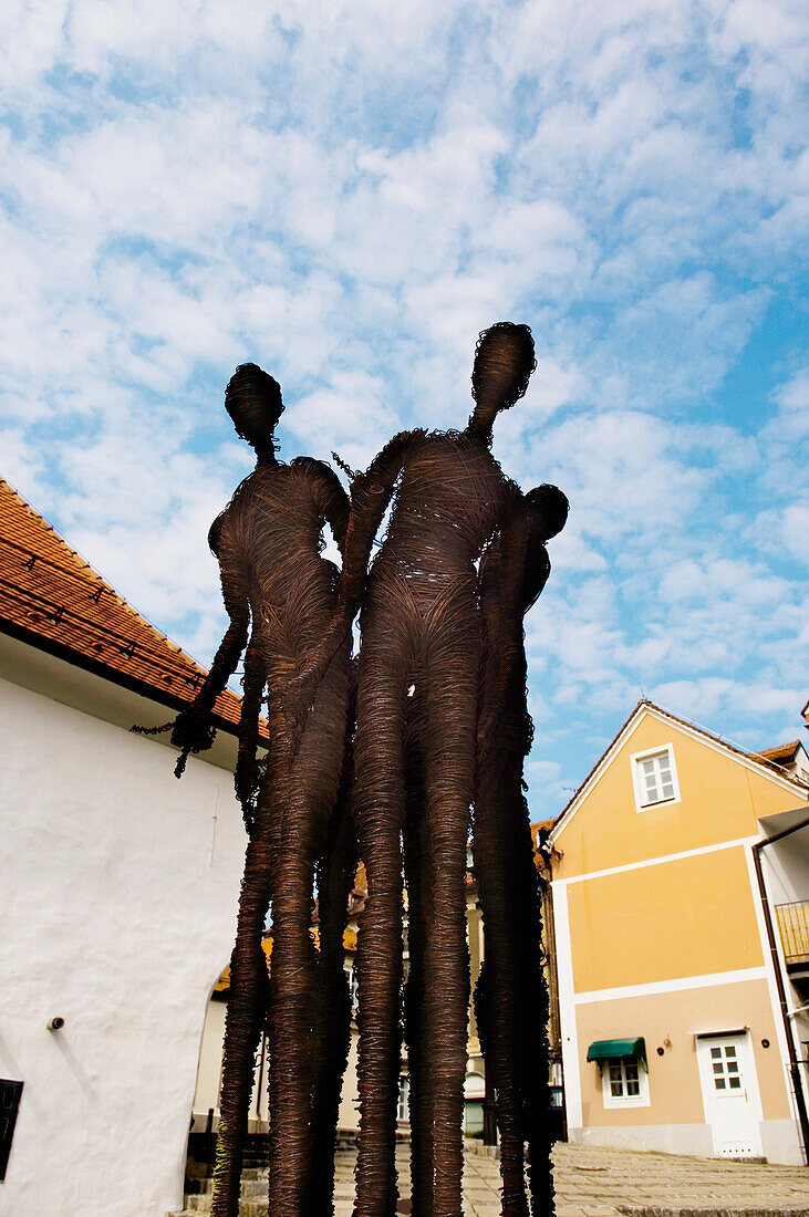 Statue Five organic perils outside old synagogue in Jewish quarter, Maribor, Slovenia