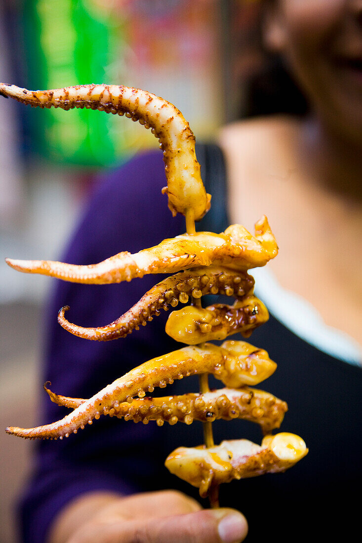 Squid tentacles grilled on stick, Mong Kok, Kowloon, Hong Kong, China