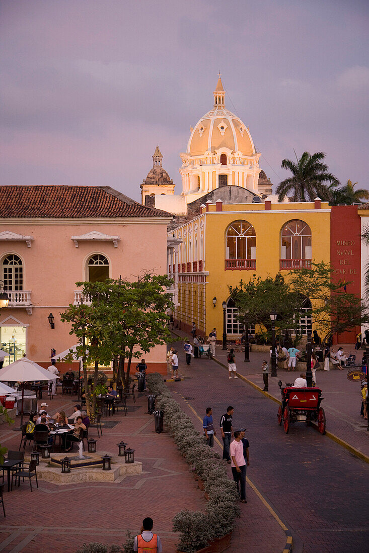 Colombia, View of Cartagena after sunset with dome of San Pedro Claver in background, Cartagena