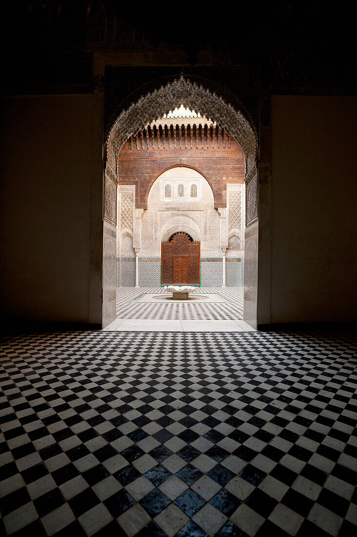 Looking into courtyard of Medersa El-Attarine in medina, Fez, Morocco