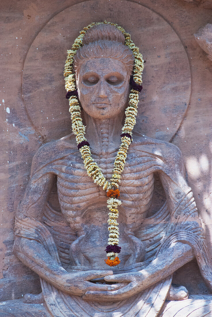 Statue of the Buddha at the Mahabodhi Temple depicting his austerity/starvation phase, Bohdgaya, Bihar, India
