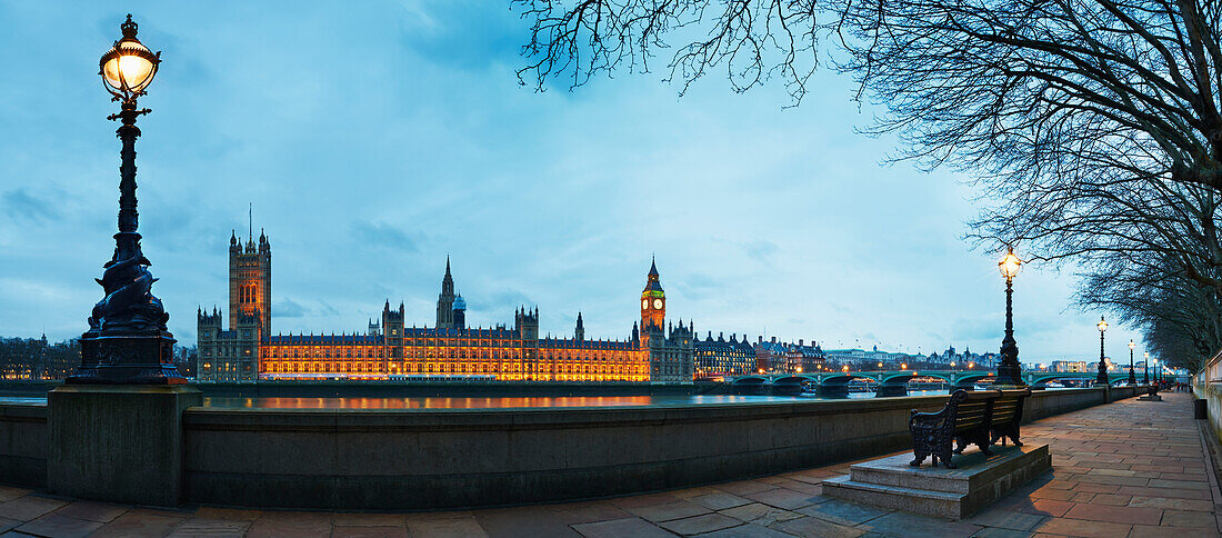 Panoramic view of Houses of Parliament at dusk from River Thames, London, UK