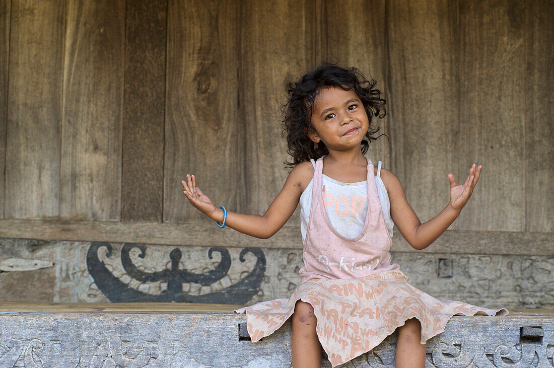 Young girl in Bena, a traditional Ngada village, Flores, Nusa Tenggara Timur, Lesser Sunda Islands, Indonesia, Asia