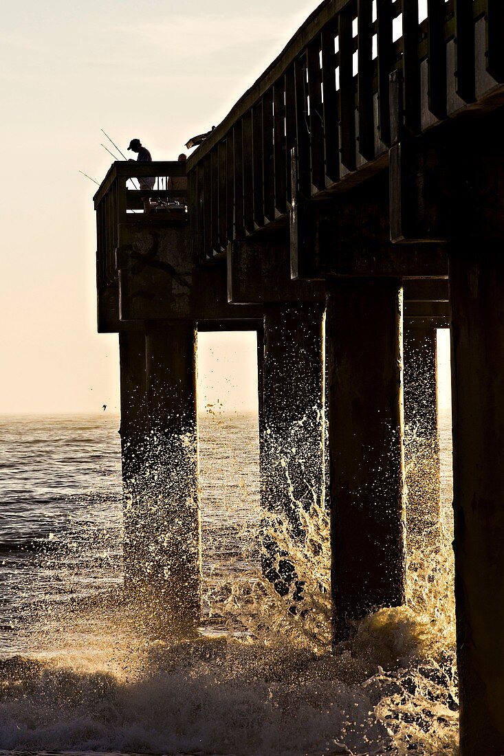 Sunrise over a fishing pier on St Augustine Beach, Florida