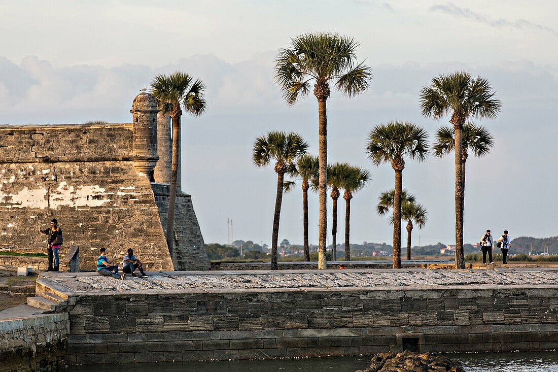 People look out at Matanzas Bay from the walls of the Castillo de San Marcos in St  Augustine, Florida  St Augustine is the oldest city in America