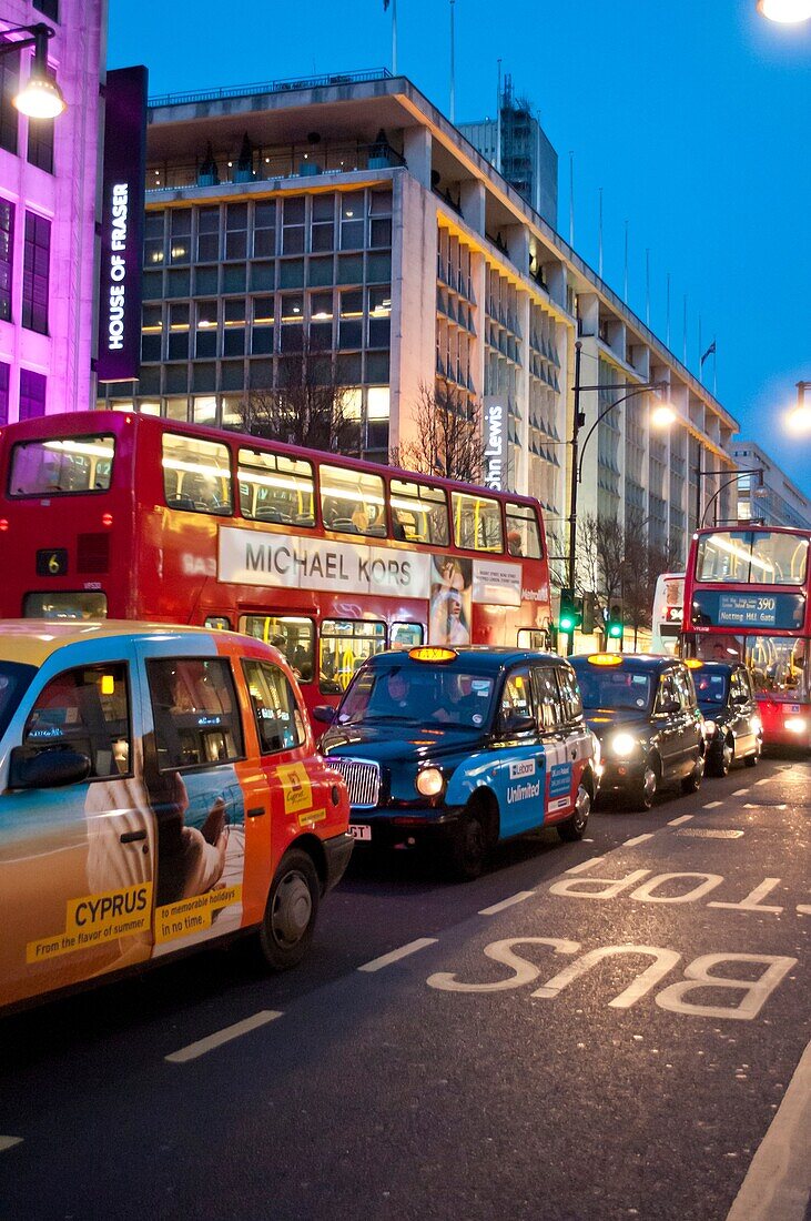 Traffic on Oxford Street at dusk, London UK