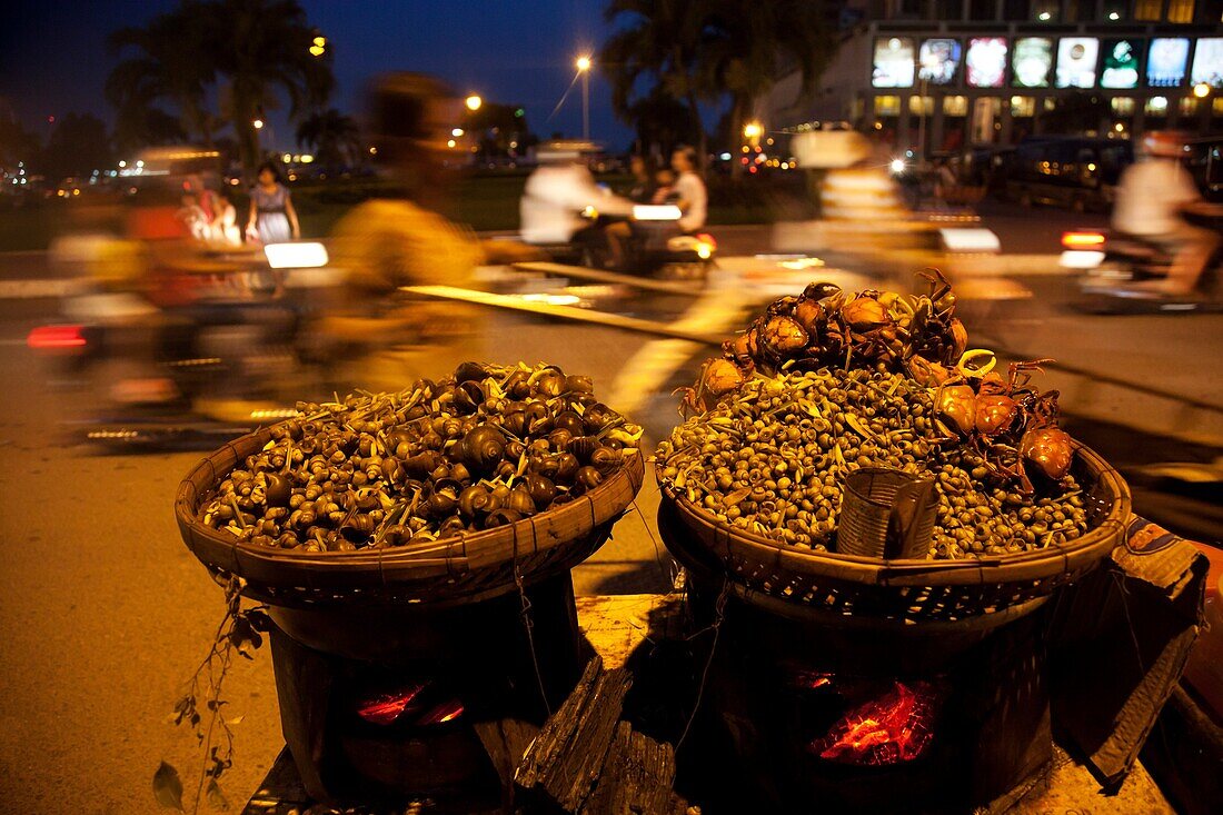 Street seafood in a night market in Phnom Penh Cambodia