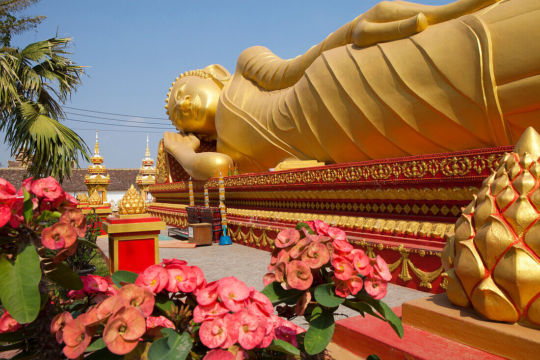 Golden Buddha at Pha That Luang Monument in Vientiane, capital of Laos, Asia