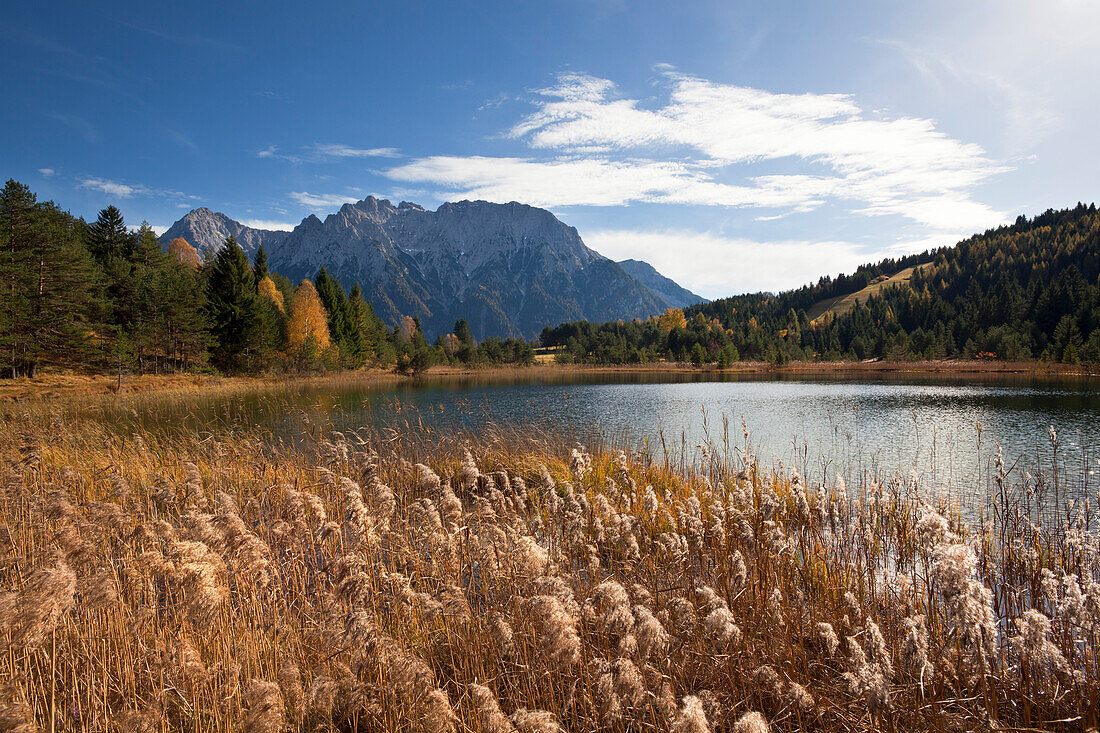 View over lake Luttensee to the Karwendel mountains, near Mittenwald, Bavaria, Germany