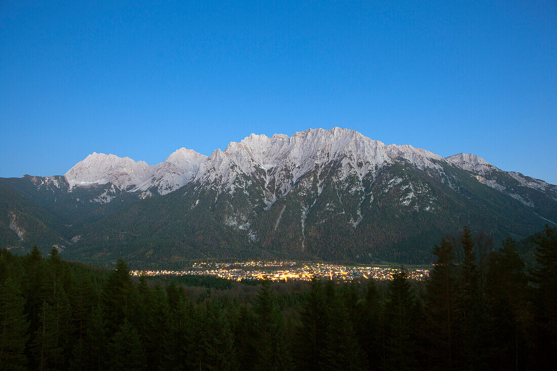 View from Hoher Kranzberg to Mittenwald and the Karwendel mountains, Bavaria, Germany