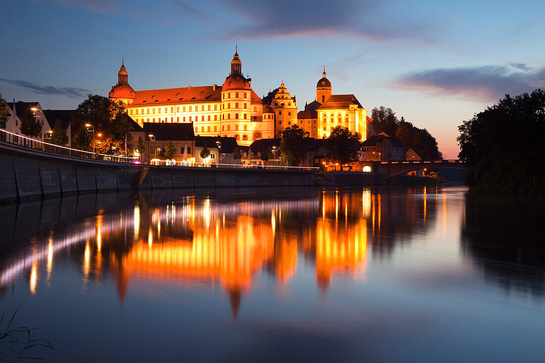 View over the river Danube to Neuburg castle in the evening light, Neuburg an der Donau, Bavaria, Germany