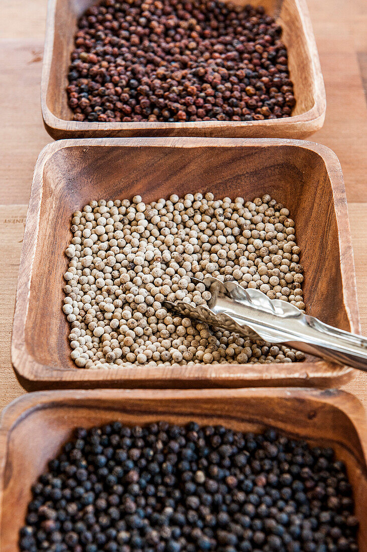 Three dishes with peppercorns