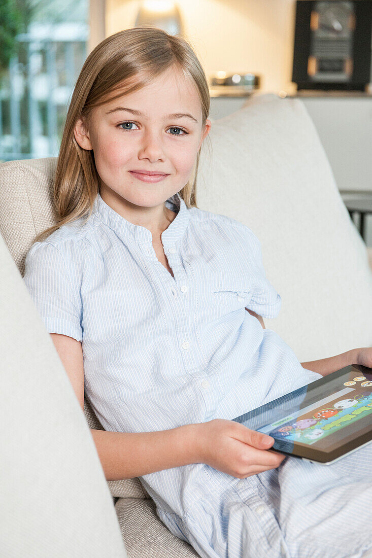 Girl using an iPad, Hamburg, Germany