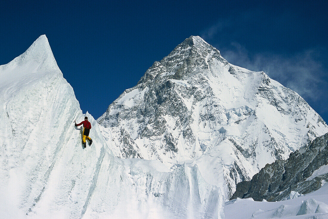 Ice climbing on serac under K2, Godwin Austen Glacier, Karakoram Mountains, Pakistan