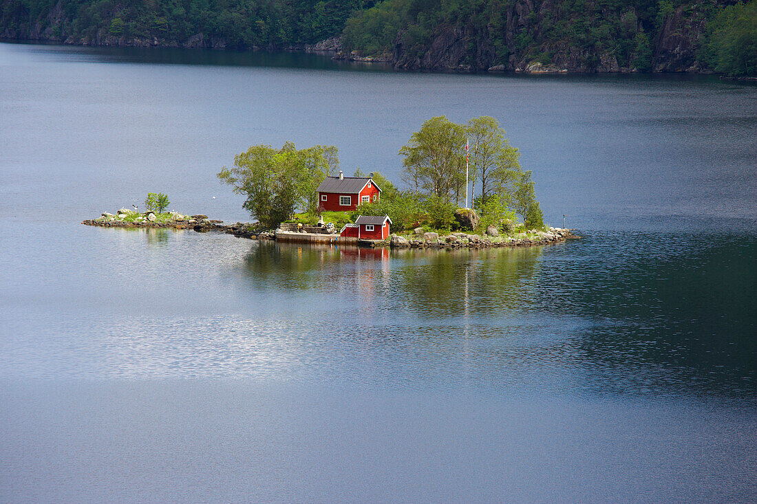 Island with red house at Lovrafjord near Sand at RV 13, Province of Rogaland, Vestlandet, Norway, Europe