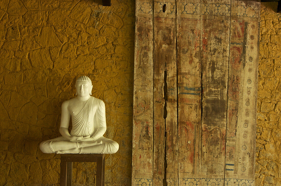 Meditating Buddha in the Meditation room of the The Samadhi Center, resort in the mountains near Kandy, Sri Lanka