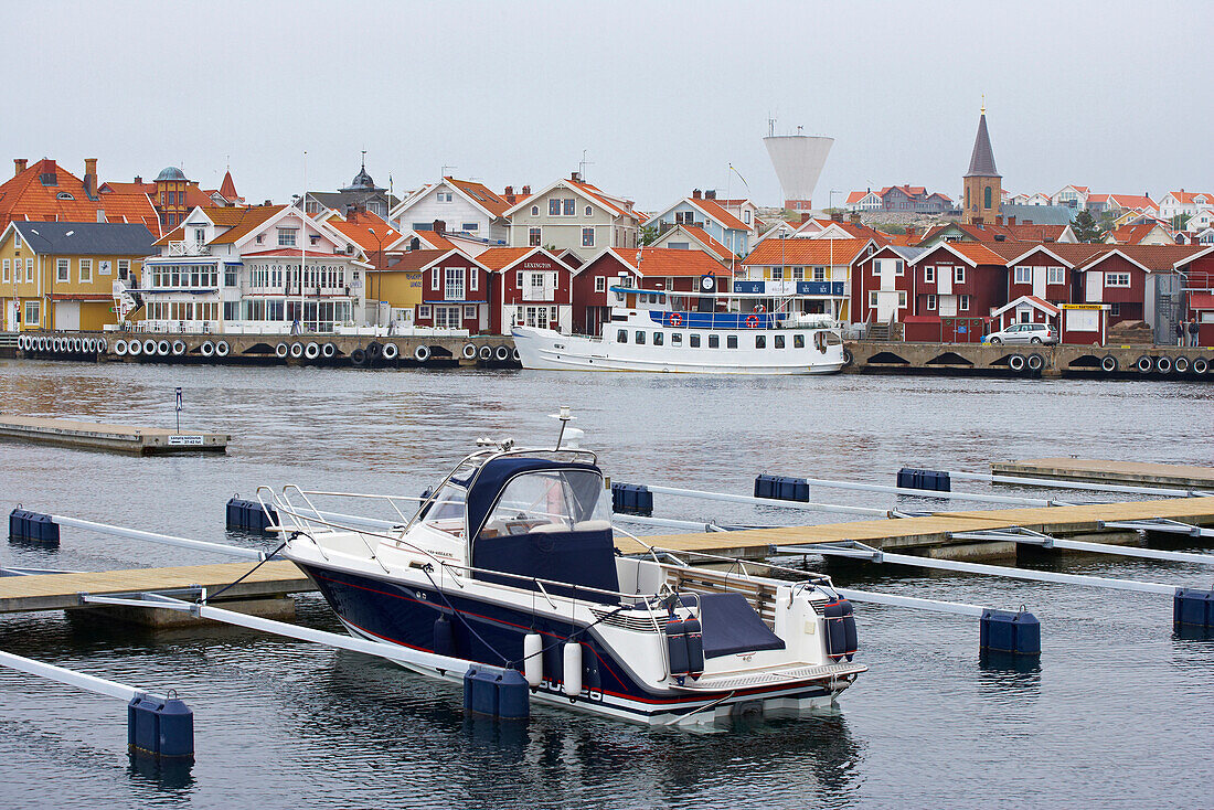 Boats and boat houses in the port of Smoegen, Sotenas Peninsula, Province of Bohuslaen, West coast, Sweden, Europe