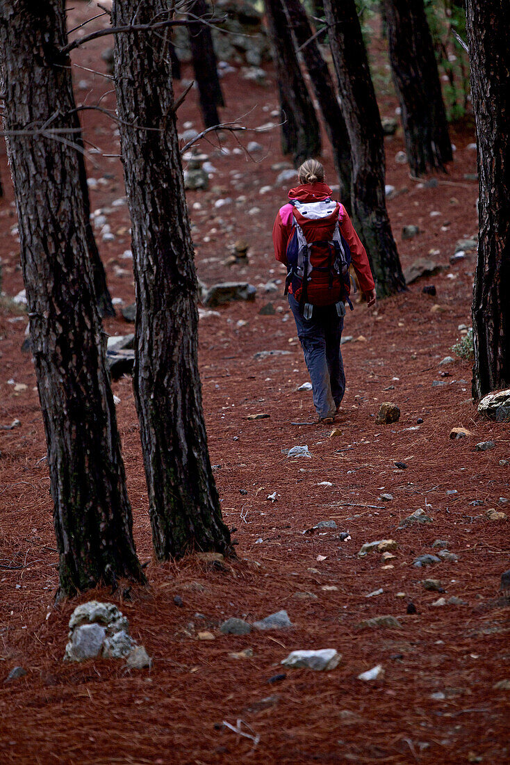 Woman hiking along long-distance footpath Lycian Way, Antalya, Turkey