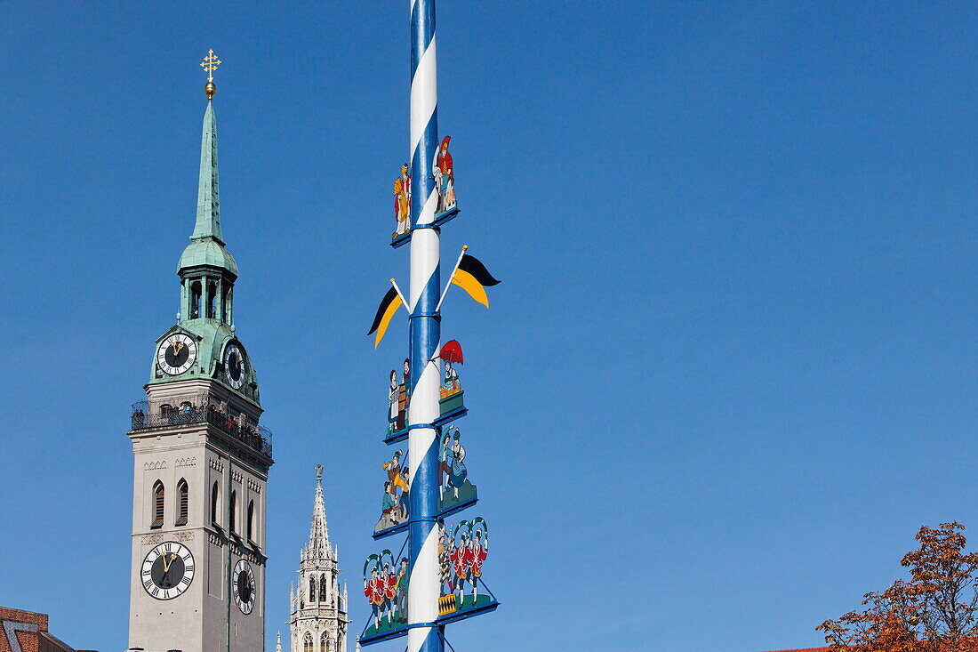 Steeples of St. Peter's church and the city hall, May pole at Viktualienmarkt, Munich, Upper Bavaria, Bavaria, Germany
