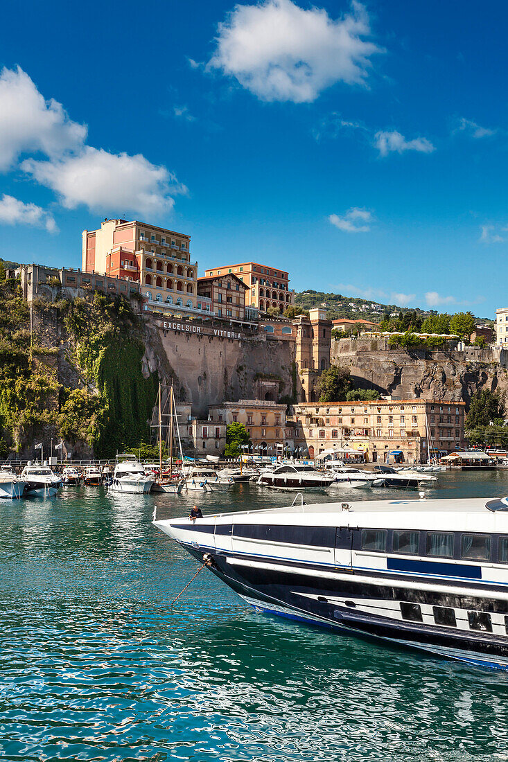 Marina Piccola Harbour with Grand Hotel Excelsior in the background, Sorrento, Peninsula of Sorrento, Bay of Naples, Campania, Italy