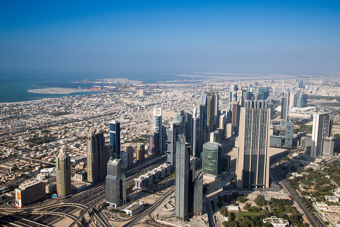 View across skyline from At The Top observation deck on level 124 of Burj Khalifa tower, Dubai, United Arab Emirates