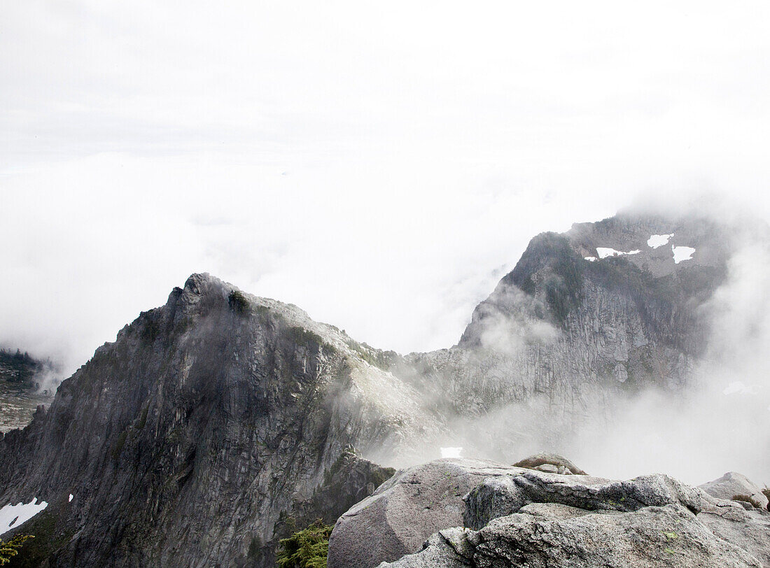 A peak on a foggy, wet morning in the mountains Washington, USA