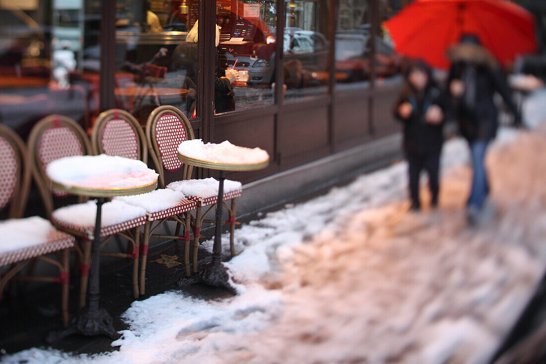 Cafe in Snow, Paris, Ile de France, France
