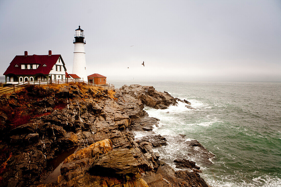 Portland head light photographed late in the afternoon under fog in Maine Portland, Maine, USA