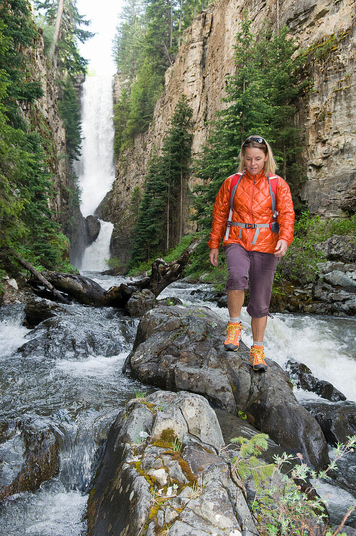 A woman hiking below Ames Falls, Ames, Colorado., Ames, Colorado, usa