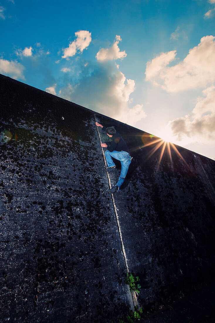 An Italian climber scales a concrete wall in Groningen, the Netherlands., Groningen, Groningen, The Netherlands