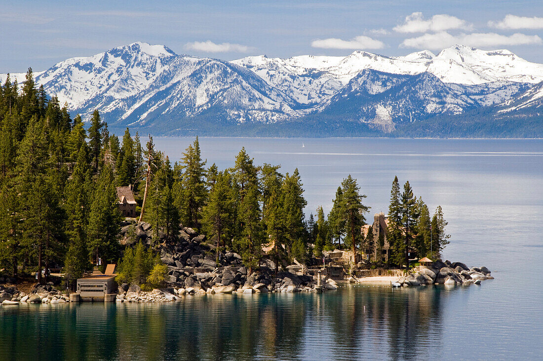 The famous property of the Thunderbird Lodge is framed by Lake Tahoe and the snow-capped peaks of the Sierra Nevada, NV., Lake Tahoe, Nevada, USA