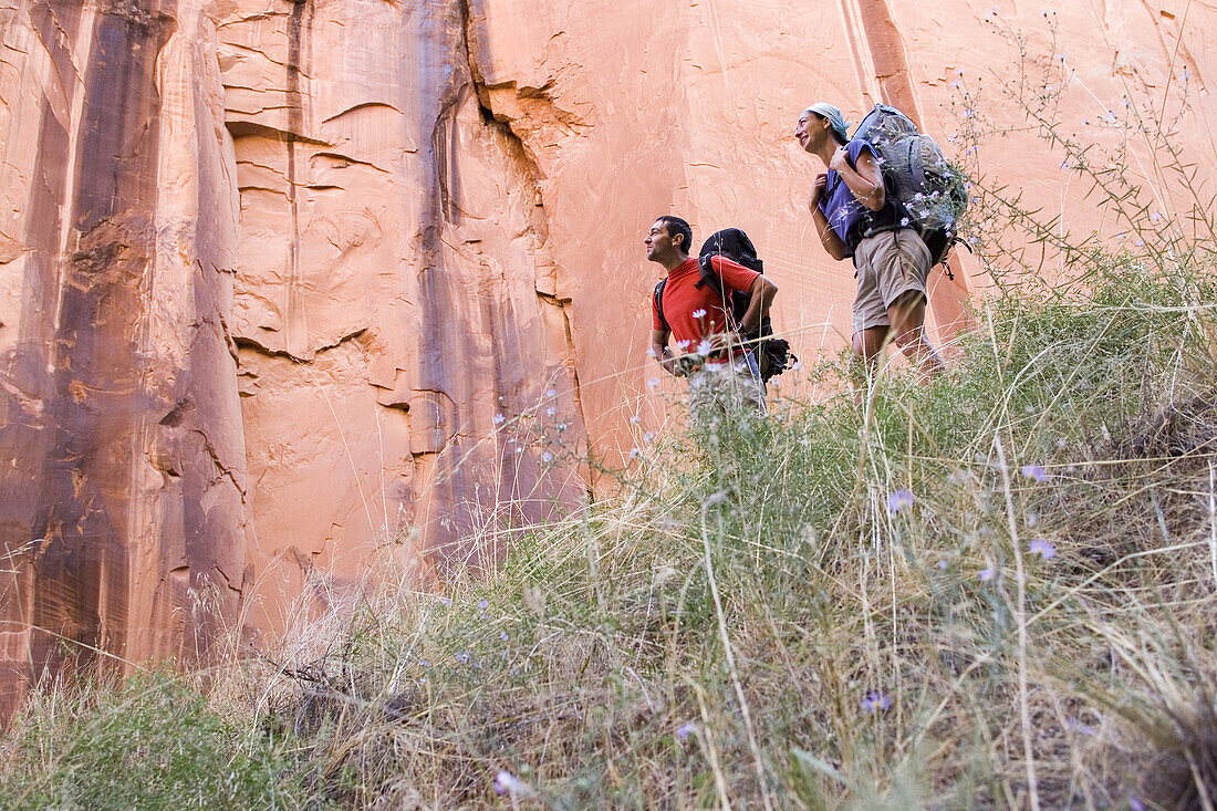 Two hikers in a canyon in Utah, USA Paria Canyon, Utah / Arizona, United States