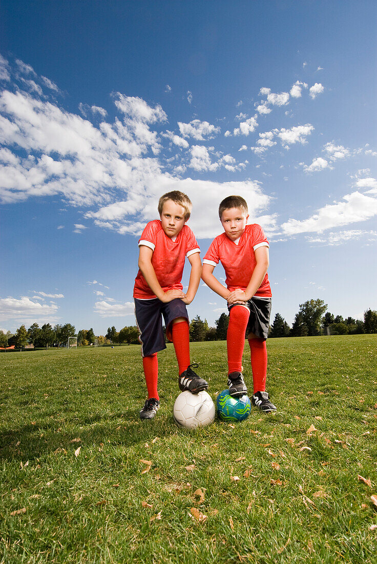 Two boys pose for a picture while playing soccer in Fort Collins, Colorado Fort Collins, Colorado, USA