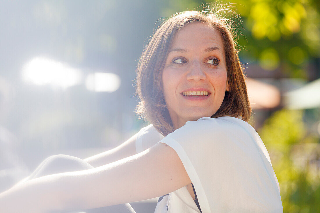 Mid adult woman smiling, Munich, Bavaria, Germany