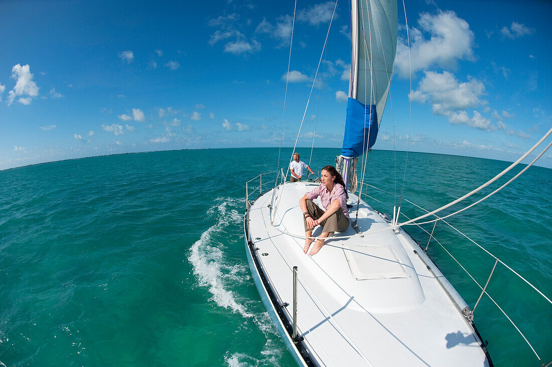 A man and woman sailing off of Florida Key West, Florida, USA
