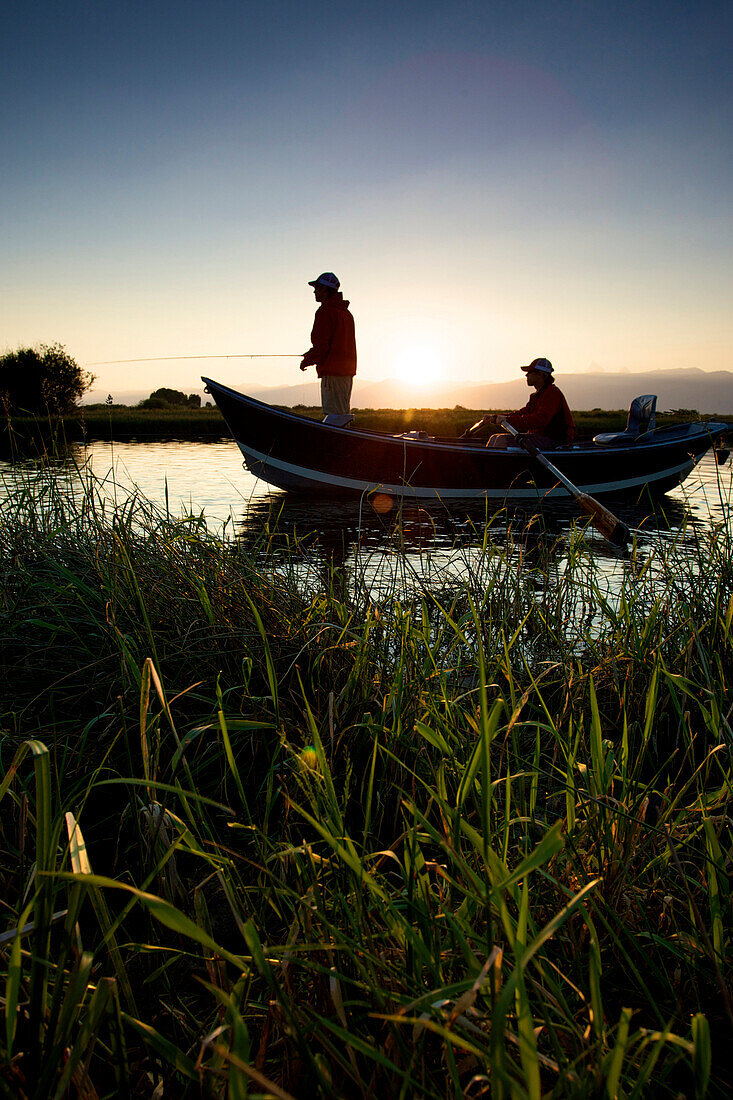 Two men fish the Teton River near Driggs, Idaho Driggs, Idaho, USA