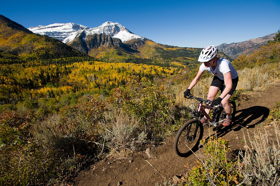 Female mountain biker riding in the mountains, Provo, Utah Provo, Utah, United States