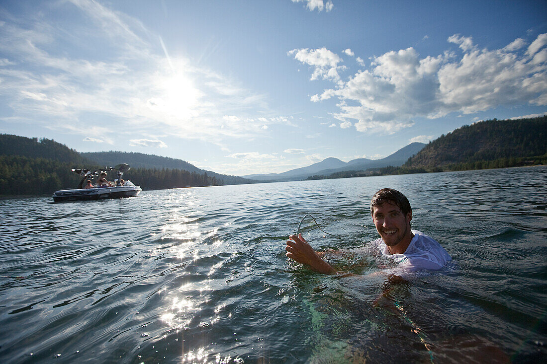 Male wakeboarding in Idaho Sandpoint, Idaho, USA