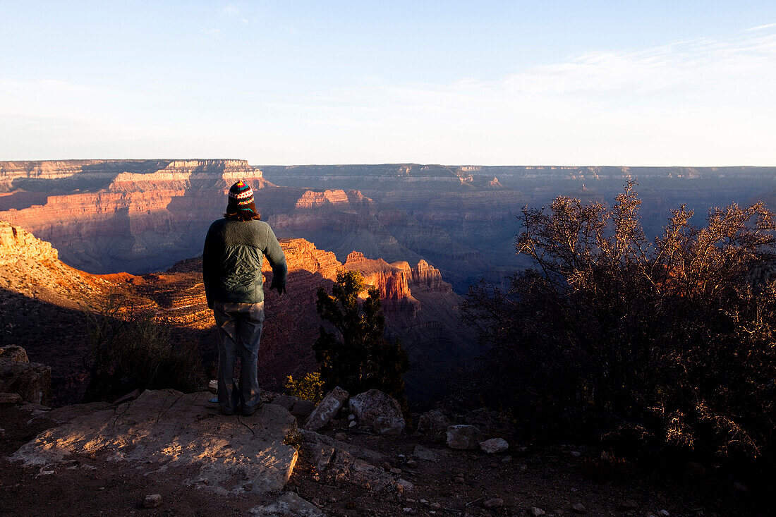 A woman stares at Arizona's Grand Canyons North Rim Grand Canyon, Arizona, United States of America