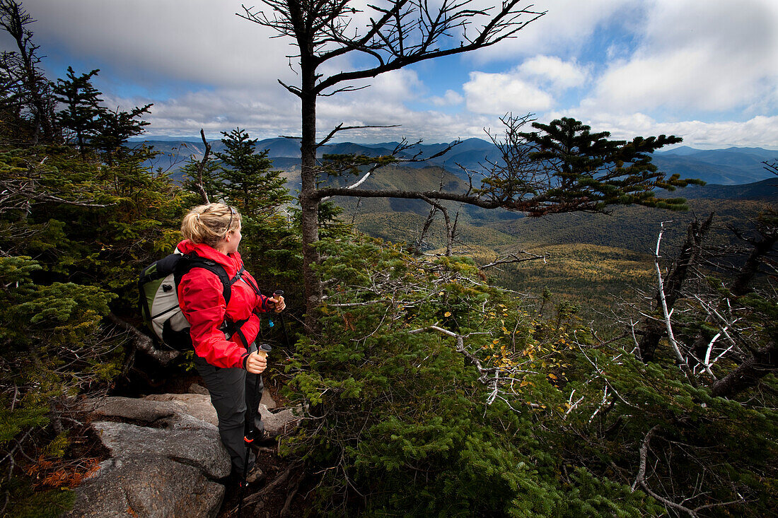 An athletic female hikes the Franconia Ridge Trail Franconia, New Hampshire, United States of America