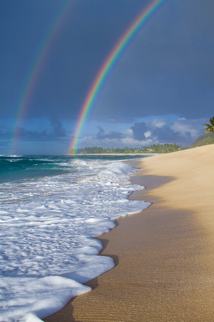 An amazing double rainbow over Rocky Point, on the north shore of Oahu, Hawaii north shore, Oahu, Hawaii, USA